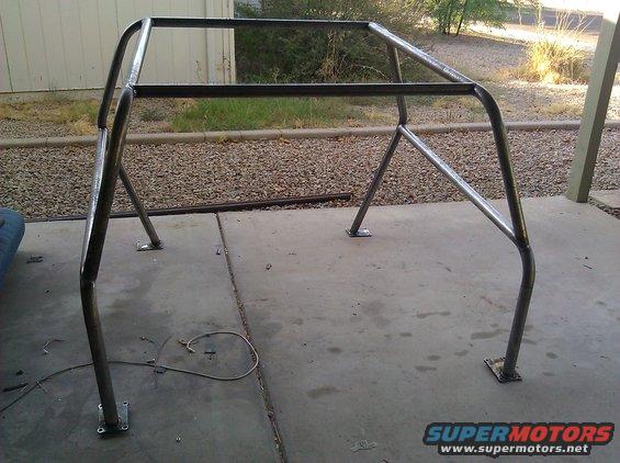 custom metal roll cage frame with four mounting plates
