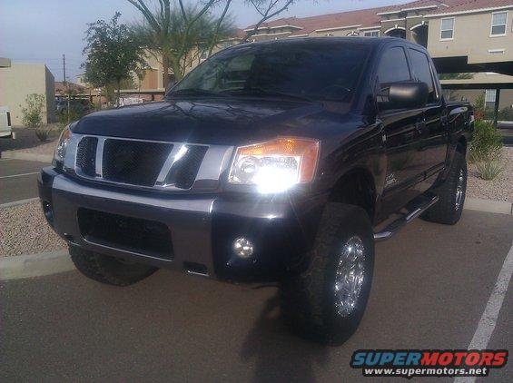 Black 2008 Nissan Titan pickup truck, 3/4 front view