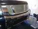 2008 Nissan Titan - Front view of a 2008 Nissan Titan's custom grille with chrome trim and mesh.