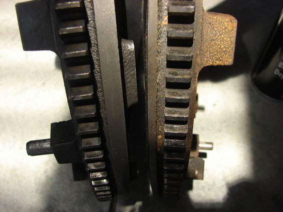 Side view. Lightened Fly on right. All balancing boss' and approximately half the back side of the fly removed to reduce weight and then rebalanced.