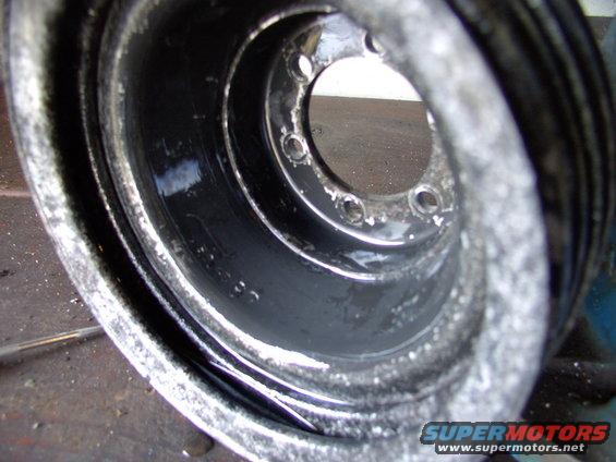 img_0052.jpg The balancer pulley is completely rust free. Try that with a wire brush.