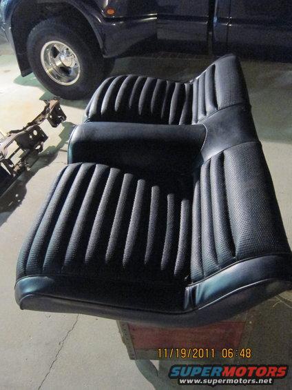 Black vinyl bucket seats with ribbed pattern
