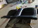 1969 Ford Mustang - A black vinyl car seat with ribbed upholstery is shown resting on a tarp.