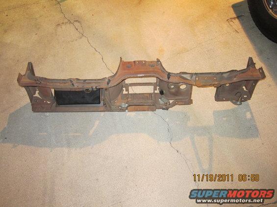 Rusted dashboard frame with black box on left