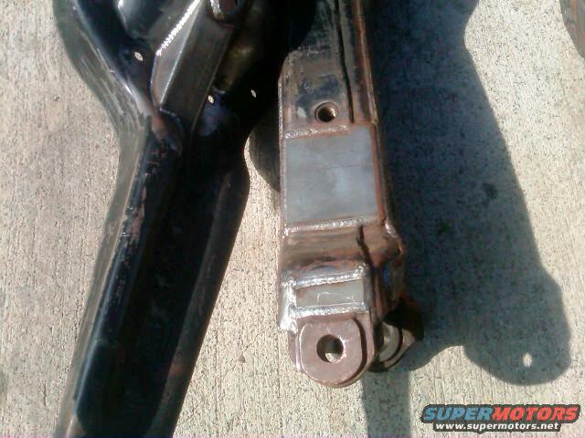 close-up of welded suspension components on concrete