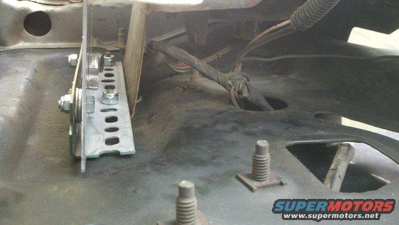 Custom bracket and wiring harness under vehicle