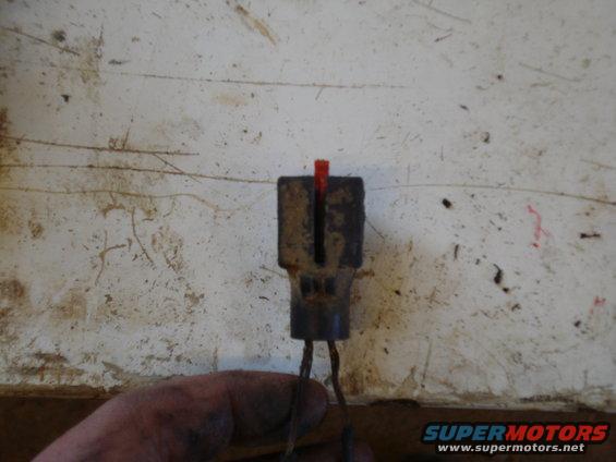 Electrical connector with red indicator and wires