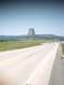 2007 Dodge Caliber - View of Devils Tower National Monument from a highway on a sunny day.