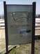 2007 Dodge Caliber - An outdoor information sign displays a map and details about the West Thumb Geyser Basin.