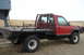 1994 GMC Sierra 3500 - This 1994 GMC Sierra 3500 flatbed truck is equipped with a gooseneck hitch and a custom bed.