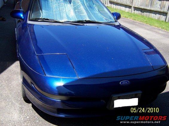 Blue 1993 Ford Probe front view with pop-up headlights down