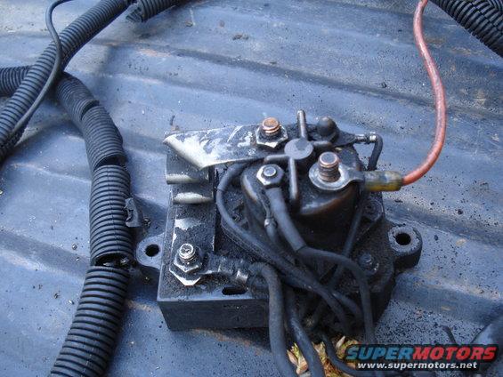 Starter solenoid with black wiring harness connected