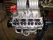 1996 Ford Bronco - Close-up of a V8 engine assembly, aftermarket performance components and a red MSD ignition distributor.