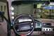 1996 Ford Bronco - The interior of a 1996 Ford Bronco shows aftermarket gauges and a steering wheel cover.