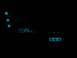 1996 Ford Bronco - Interior view of a car at night with illuminated dashboard gauges and controls.