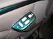 1996 Ford Bronco - Interior door panel with power window controls, painted green with metallic flakes.