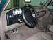 1996 Ford Bronco - The interior of a 1996 Ford Bronco, showing the dashboard, steering wheel, and pedals.