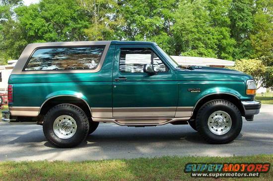 Green 1996 Ford Bronco parked on a street