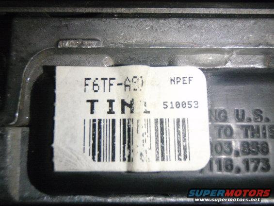 Label on an electronic control unit with part number F6TF-A9D and serial number 510053