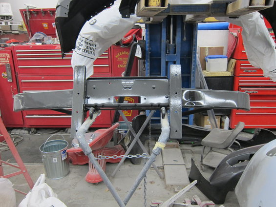 Front bumper assembly on stand, gray primer finish