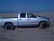 2005 Dodge 1500 - Silver 2005 Dodge 1500 pickup truck stuck in sand dunes.