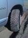 2005 Dodge 1500 - A 2005 Dodge 1500's aggressive off-road tire is shown on a sandy surface.