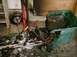 1989 Ford Bronco - Debris and damaged items litter the floor following a garage fire.
