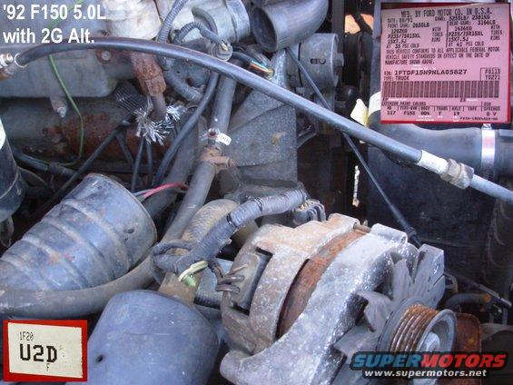 92f2g.jpg 2G Alternator on a '92 F150 5.0L
'93-up have a 3G alternator.  All 2Gs are fire hazards, despite the TSB below.  They should all be upgraded to 3G, and it's nearly a PnP swap.

[url=https://www.supermotors.net/registry/media/566009][img]https://www.supermotors.net/getfile/566009/thumbnail/alt94tbird.jpg[/img][/url]

See the NEXT several captions....

-------------------------------------------------------------
TSB 96-21-04 Generator Harness Connector

[url=http://www.supermotors.net/registry/media/910523][img]http://www.supermotors.net/getfile/910523/thumbnail/altwiring2g3g.jpg[/img][/url]

Publication Date: OCTOBER 7, 1996  

FORD:  1985-90 ESCORT, TEMPO
1986 TAURUS
1986-90 CROWN VICTORIA
1987-92 THUNDERBIRD
1987-93 MUSTANG
LINCOLN-MERCURY:  1985-87 LYNX
1985-90 TOPAZ
1986 SABLE
1986-90 GRAND MARQUIS, TOWN CAR
1987-92 COUGAR
LIGHT TRUCK:  1985-90 BRONCO II
1985-91 AEROSTAR
1986-91 ECONOLINE
1986-92 RANGER
1986-93 BRONCO
1986-94 F-150-350 SERIES

[url=http://www.supermotors.net/registry/media/843760][img]http://www.supermotors.net/getfile/843760/thumbnail/alternator2gex.jpg[/img][/url]

ISSUE: When a generator fails, there are a few failure modes that may cause heat to be produced at the wiring harness-to-generator connector. This excess heat may damage the female terminals on the wiring harness, resulting in increased resistance. The increased resistance produces more heat. When the generator is replaced, the resistance produced by a damaged connector may damage the new generator and could result in a repeat repair, including installation of another generator. High resistance (caused by a damaged connector) will not go away until the damaged connector is replaced.

ACTION: Visually inspect the harness-to-generator connector for damage (heat, corrosion, distortion and cracking) before installing a new generator. Install the Generator Wiring Harness Connector Kit (E5AZ-14305-AA) if the harness-to-generator connector is damaged.

The Generator Wiring Harness Connector Kit (E5AZ-14305-AA) contains the following:

One (1) Red Wire Butt Connector
Two (2) Yellow Wire Butt Connectors
One (1) Wire Connector Assembly
One (1) Instruction Sheet (I.S. 6849)

PART NUMBER  PART NAME  
E5AZ-14305-AA  Generator Wiring Harness Connector Kit

OTHER APPLICABLE ARTICLES: NONE
SUPERSEDES: 95-25-04
WARRANTY STATUS: INFORMATION ONLY

--------------------------------------------------------------------------------

To test the alt, first install a good CHARGED battery.  Then momentarily ground the screw on the back of the alt where it says GROUND HERE TO TEST (the Field brush screw) using a jumper wire with the engine at 1500-2500RPM.  Have a voltmeter connected across the battery posts.  The voltage should instantly spike over 15.5V, and continue to climb slowly.  Don't ground that screw for any longer than it takes to make this observation (a couple of seconds).  If it fails, the fault could be in the alternator, the wiring, or any connection (including the alt to the block).
[url=http://www.supermotors.net/registry/media/843907][img]http://www.supermotors.net/getfile/843907/thumbnail/alternator3gvr.jpg[/img][/url]

--------------------------------------------------------------------------------

TSB 98-24-06 New Electrical Terminal Grease Released for Service

Publication Date: NOVEMBER 25, 1998 

FORD:
1981-1999 ESCORT 
1983-1999 CROWN VICTORIA 
1984-1988 EXP 
1984-1994 TEMPO 
1985-1999 TAURUS 
1986-1997 PROBE 
1988-1991 FESTIVA 
1993-1999 MUSTANG 
1994-1997 ASPIRE 
1995-1999 CONTOUR 
1996-1997 THUNDERBIRD

LINCOLN-MERCURY:
1983-1999 CONTINENTAL, GRAND MARQUIS 
1984-1986 CAPRI 
1984-1987 LN7 
1984-1994 TOPAZ 
1985-1999 SABLE 
1988-1992 MARK VII 
1991-1994 CAPRI 
1993-1998 MARK VIII 
1993-1999 TRACER 
1995-1999 MYSTIQUE 
1996-1997 COUGAR, TOWN CAR 
1999 COUGAR

MERKUR:
1985-1988 XR4TI 
1988 SCORPIO

LIGHT TRUCK:
1981-1996 BRONCO 
1981-1997 F SUPER DUTY, F-250 HD, F-350 
1981-1999 ECONOLINE, F-150, F-250 LD 
1983-1999 RANGER 
1984-1990 BRONCO II 
1984-1997 AEROSTAR 
1991-1999 EXPLORER 
1993-1999 VILLAGER 
1995-1999 WINDSTAR 
1997-1999 EXPEDITION, MOUNTAINEER 
1998-1999 NAVIGATOR 
1999 SUPER DUTY F SERIES

MEDIUM/HEAVY TRUCK:
1984-1999 F & B SERIES 
1988-1997 CARGO SERIES 
1996-1998 AEROMAX, LOUISVILLE

ISSUE: Ford Motor Company has released a new Electrical Grease (F8AZ-19G208-AA) to reduce the possibility of moisture corrosion at the terminals.

[url=http://www.fcsdchemicalsandlubricants.com/main/product.asp?product=Electrical%20Grease&category=Greases]Electrical Grease (F8AZ-19G208-AA)

[img]http://www.fcsdchemicalsandlubricants.com/main/images/Products/XG12.jpg[/img][/url]

ACTION: Add the new grease during electrical connection repair. 

CAUTION: ELECTRICAL CONNECTOR GREASE SHOULD NOT BE USED IN HIGH VOLTAGE CONNECTIONS FOR SPARK PLUG AND COIL WIRE APPLICATIONS. 

PROPER USES OF THE NEW ELECTRICAL GREASE INCLUDE:
Electrical Connectors 
Battery Connections 
Light Sockets 
Starter Terminals

DO NOT USE ON:
Spark Plug Wires 
Coil Wires 
Spark Plug-to-Coil Connections 
Low Current Flow Switches (12V Systems less than 0.1 amp)

[url=http://www.supermotors.net/registry/media/825375][img]http://www.supermotors.net/getfile/825375/thumbnail/alternatormountboss.jpg[/img][/url] . [url=http://www.supermotors.net/registry/media/1055207][img]http://www.supermotors.net/getfile/1055207/thumbnail/06bracket02.jpg[/img][/url] . [url=http://www.supermotors.net/registry/2742/69178-4][img]http://www.supermotors.net/getfile/723279/thumbnail/07done.jpg[/img][/url]

DO NOT CONFUSE WITH [url=http://www.fcsdchemicalsandlubricants.com/main/product.asp?product=Silicone%20Brake%20Caliper%20Grease%20and%20Dielectric%20Compound&category=Greases]D7AZ-19A331-A : Silicone Brake Caliper Grease And Dielectric Compound

[img]http://www.fcsdchemicalsandlubricants.com/main/images/Products/XG12.jpg[/img][/url]