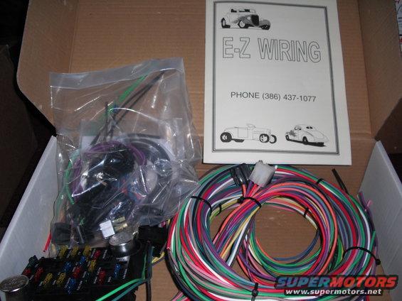 E-Z Wiring kit with fuse box, wires, and instruction sheet