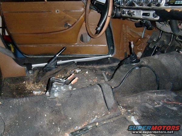 Interior of a 1969 Volvo P1800 showing dashboard and floor