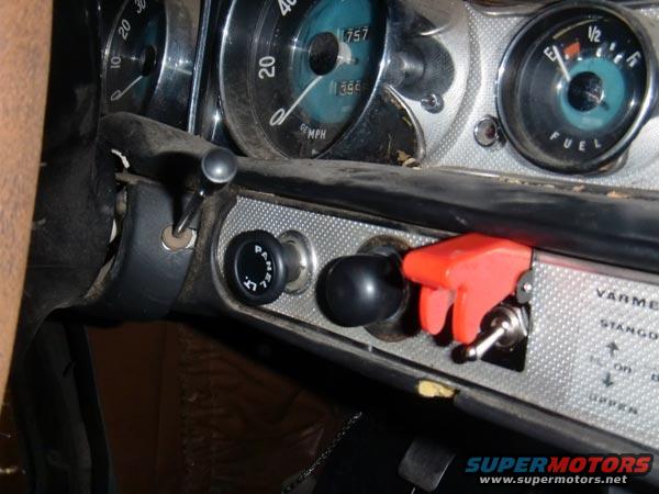 Close-up of car dashboard with fuel gauge, speedometer, and various switches. Text includes 'FUEL', 'PANEL LT.', and 'VARME'
