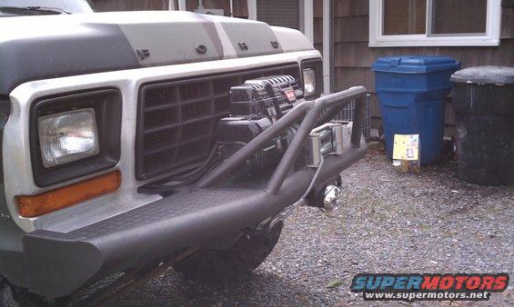 1979 Ford Bronco front end with custom bumper and winch, camouflage hood