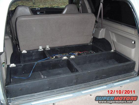 cimg7249.jpg All painted up with cabinet hinges installed and cutouts for the wiring and cooling fan