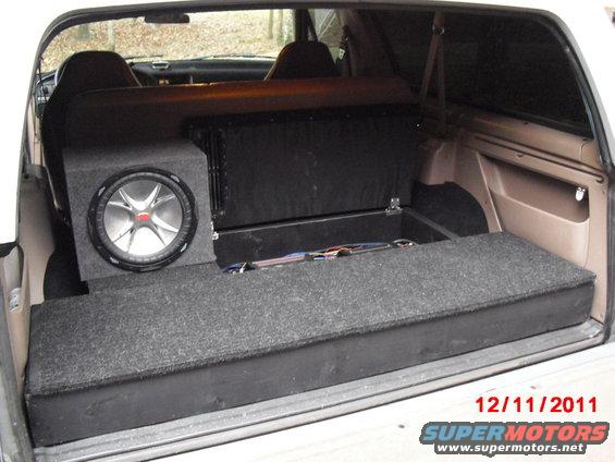 cimg7269.jpg The compartment for the amps; there is another hinged storage compartment under the subwoofer