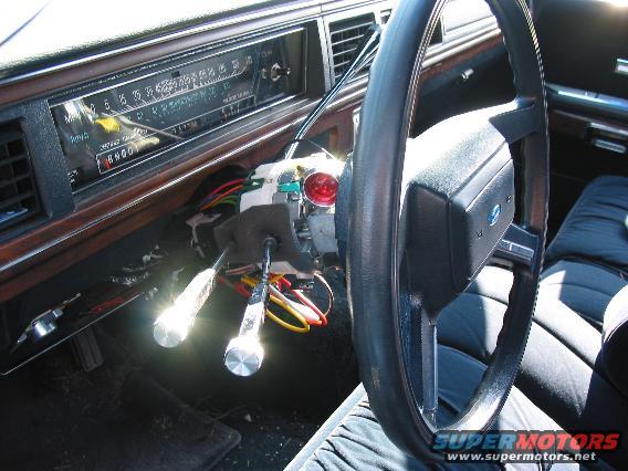 Another shot of the ignition. The red thing is the actual button. You can also see my 140mph speedometer.