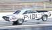 1992 Ford Mustang - A drag car with P-101 markings and an air force star emblem is captured mid-race on a track.