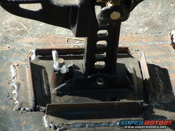 so i cut some scrap angle i had, welded it to a square of plate, added some all thread, a wingnut and a metal spacer...