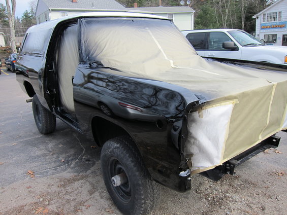 1987 Dodge Ramcharger with doors open, hood and front end covered in masking paper for painting