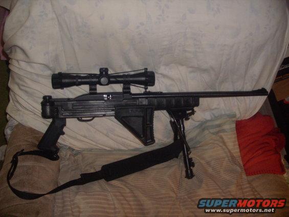 Rifle with scope and bipod