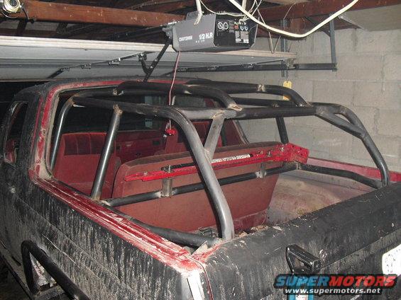 1986 Ford Bronco interior with custom roll cage installed
