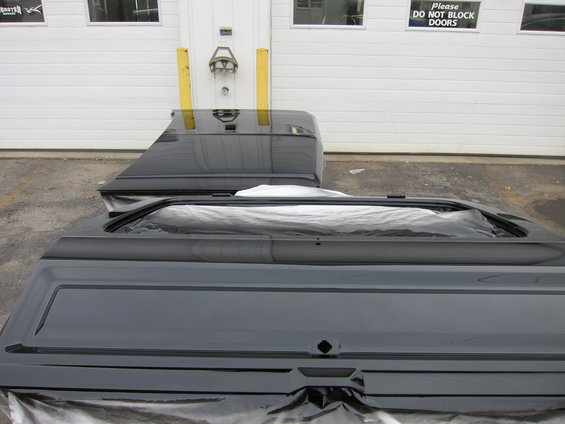 Black truck bed with tailgate and side panel