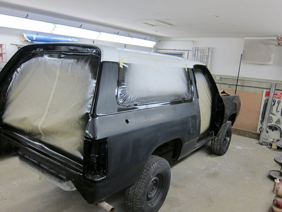 1987 Dodge Ramcharger body being prepped for paint, with windows taped off
