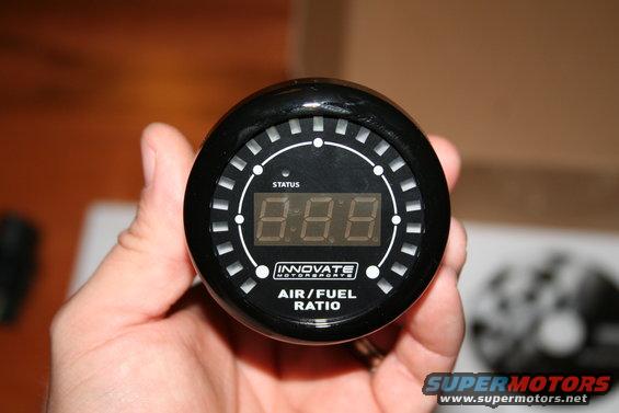 Innovate Motorsports Air/Fuel Ratio gauge held in hand