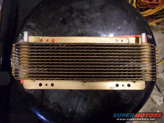 transmission cooler with fins and mounting holes