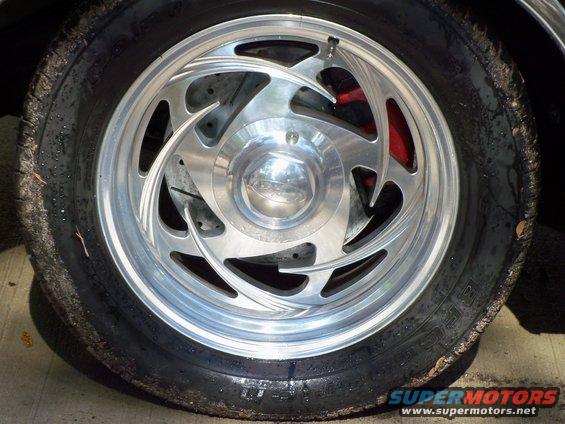 christmas-2011-057.jpg Front wheel/tire shows Crown Vic brake conversion. 12.44" drilled & slotted rotors with dual piston calipers. Z rated BFG 255/50/17's on Eagle Alloys 203 17x8.