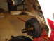 1989 Ford F-250 - Close-up of a greasy rear drum brake assembly, likely undergoing maintenance or repair.