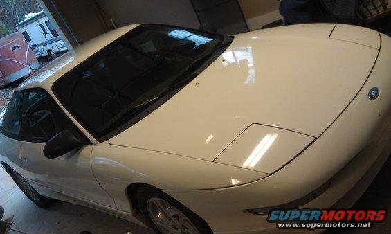 White 1997 Ford Probe with pop-up headlights