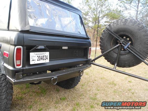 Black Ford Bronco rear view with spare tire carrier and Mississippi license plate