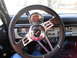 1967 Ford Mustang - The dashboard features aftermarket gauges and a Grant steering wheel, indicating custom modifications.