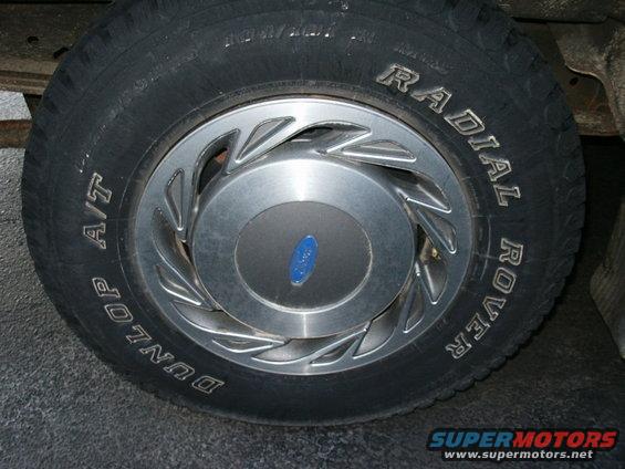 pict0722.jpg need one of these to replace one I lost.  I got 2 wheel covers in an ebay auction recently, so I have a spare one now.